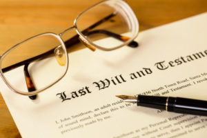 What Can Slow Down Probate? - Last will and testament with pen and glasses concept for legal d